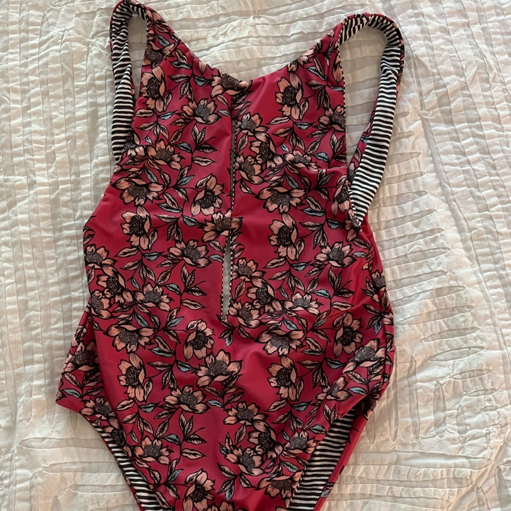 Low back beautiful bathing suit.